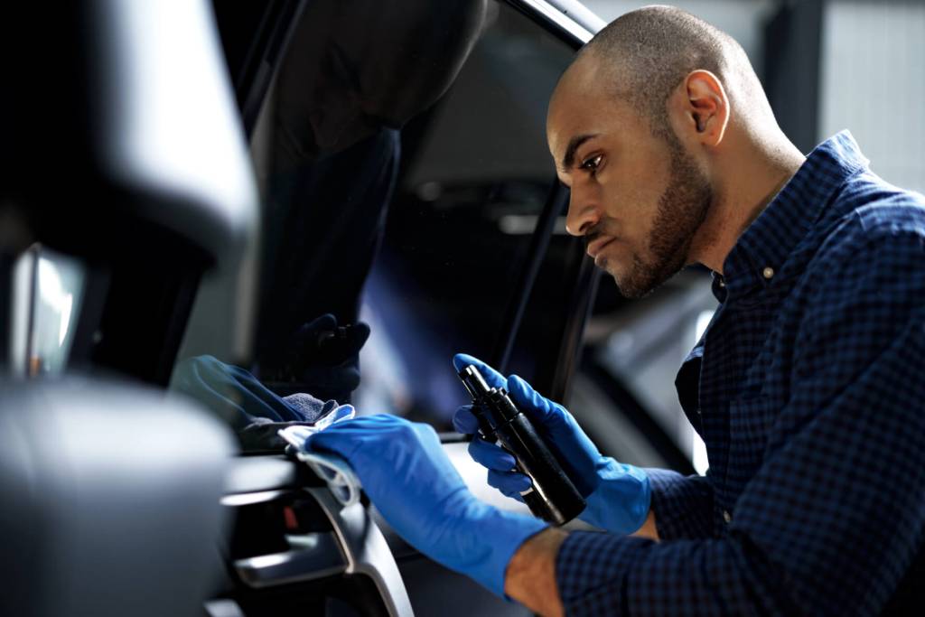 African American Man Car Service Worker Applying N Nwpdx7s.jpg